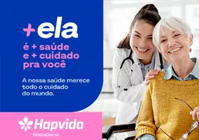 Dra sorrindo junto com a paciente.